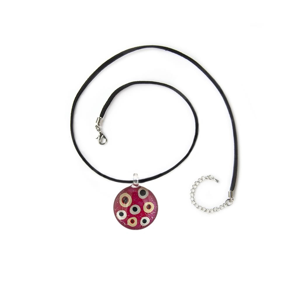 A beautiful hand-made lampwork glass pendant individually painted. Comes with a leather suede cord necklace.