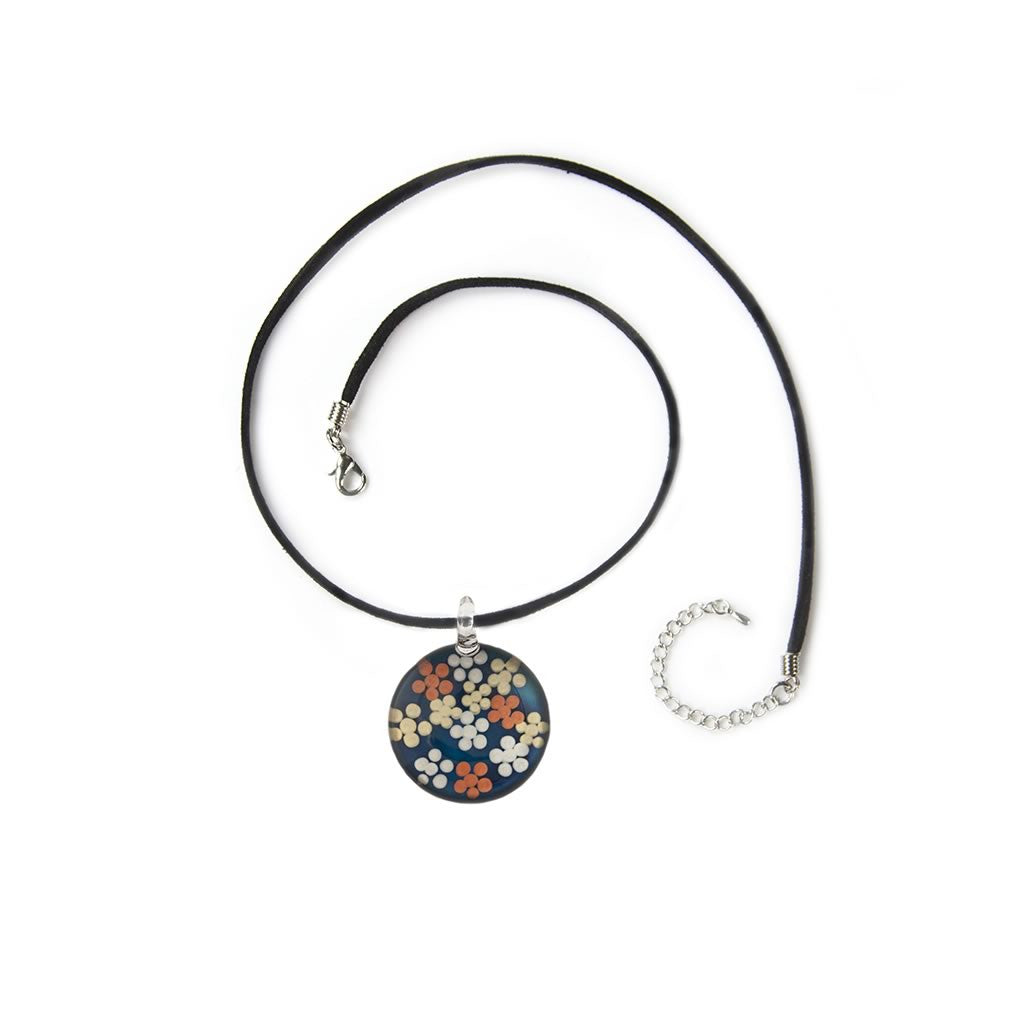 A beautiful hand-made lampwork glass pendant individually painted. Comes with a leather suede cord necklace. 