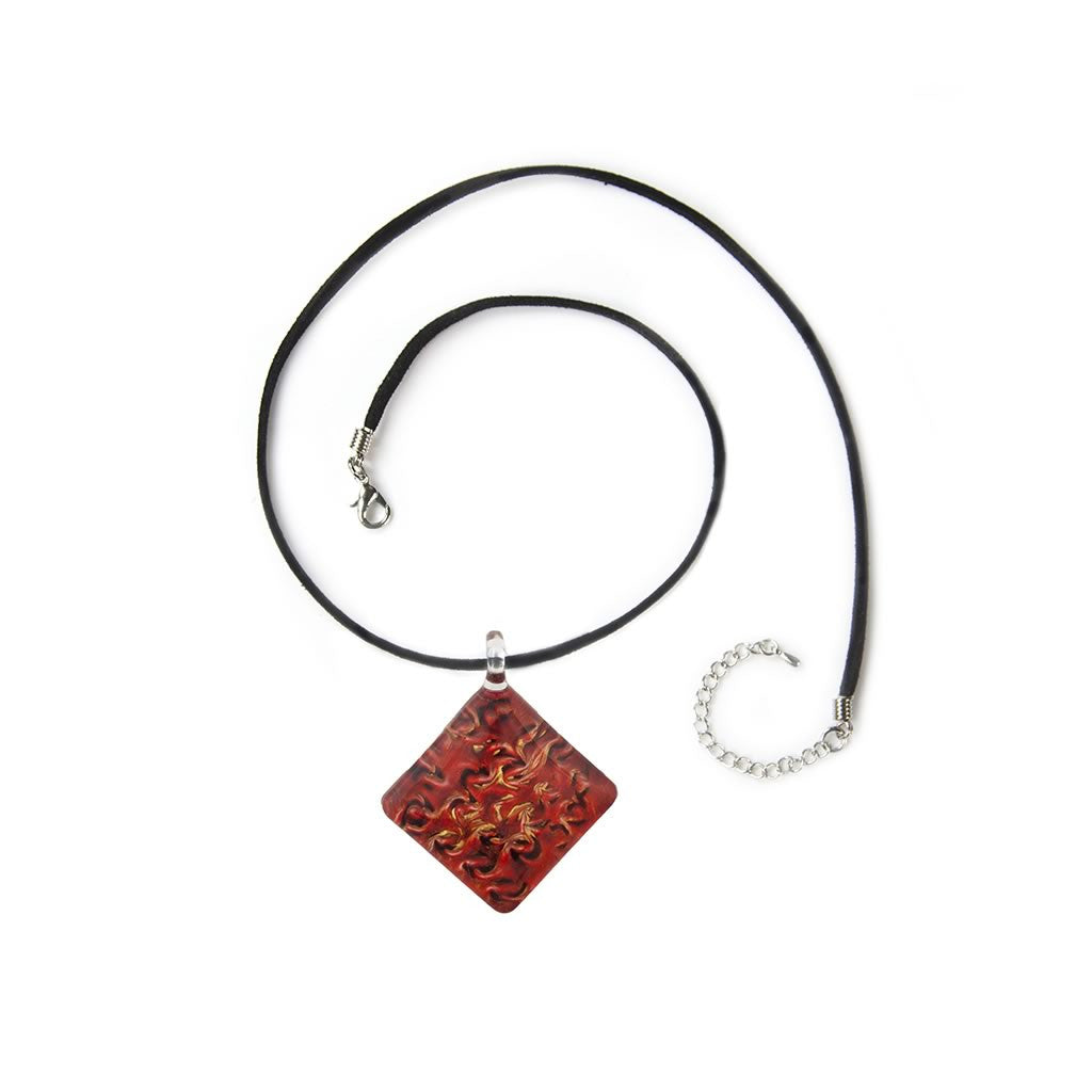 A beautiful hand-made lampwork glass pendant individually painted. Comes with a leather suede cord necklace. 
