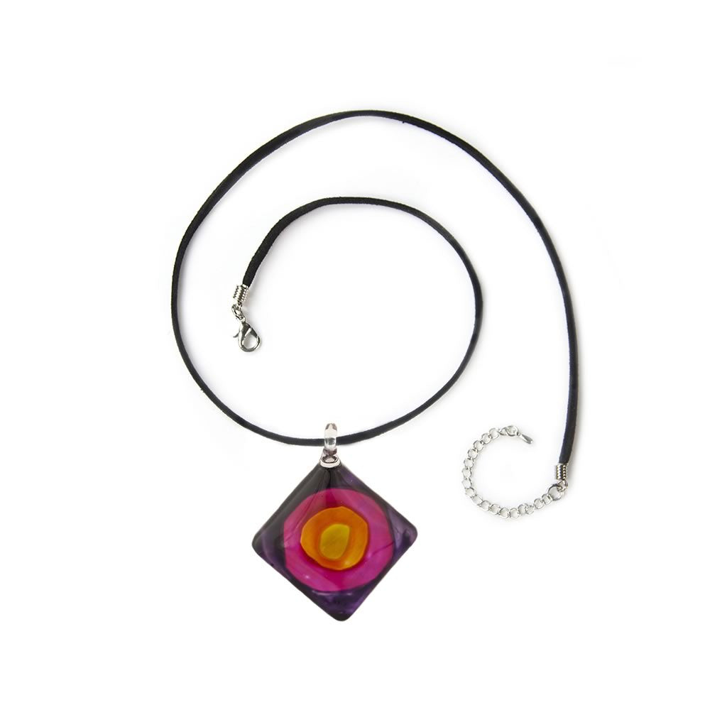 A beautiful hand-made lampwork glass pendant individually painted. Comes with a leather suede cord necklace. 